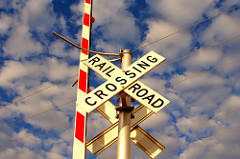 The sign with shape below is a:  A. Historical Marker  B. A Road Construction Sign  C. A Railroad Crossing Sign  D. A Lane Regulation Sign