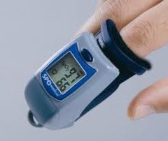 Oxygen saturation of blood can be monitored during an appointment with a ?