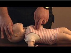 What part of the hand do you use on an infant for chest compression?