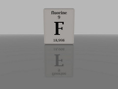 How many protons, neutrons and electrons are in a neutral atom of Fluorine?   19  F 9