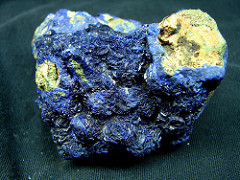 Azurite: NM; 2.5-4.5 Hardness; no cleavage; blue-brown (light); blue streak; non magnetic